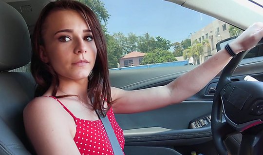 Young pretty woman driving a pick up artist makes a deep Blo...