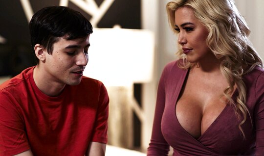 A young guy passionately fucks a blonde with big tits...